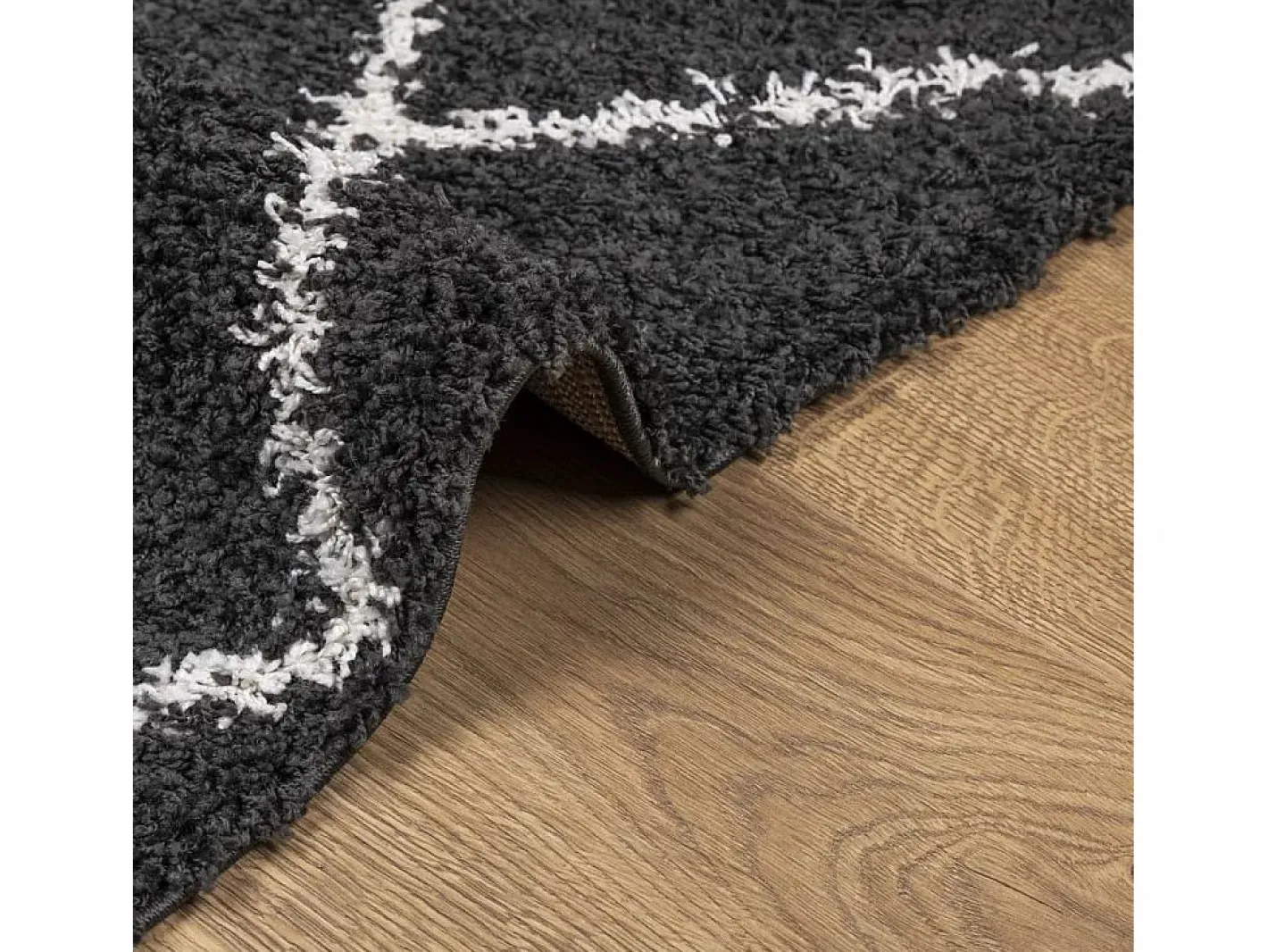 Alfombra moderna de pelo largo en color y crema de 140 x 200 cm Negro Clearance