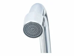 Fregadero|Lavabo de acero inoxidable con grifo y dispensador de jabón.