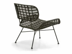 Sillón de mimbre tejido oscuro y patas de metal.^Les Tendances New