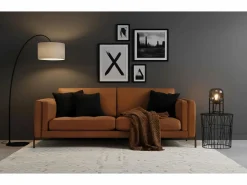 Sofá tapizado en piel estilo vintage y patas de metal 5 plazas^Giner y colomer New